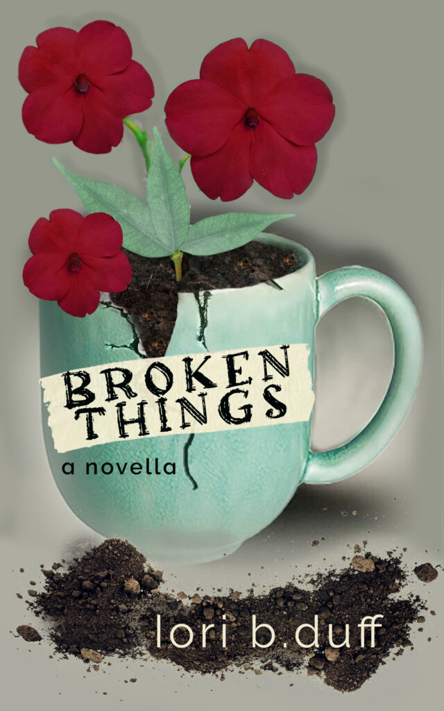 broken things mug with text and three flowers